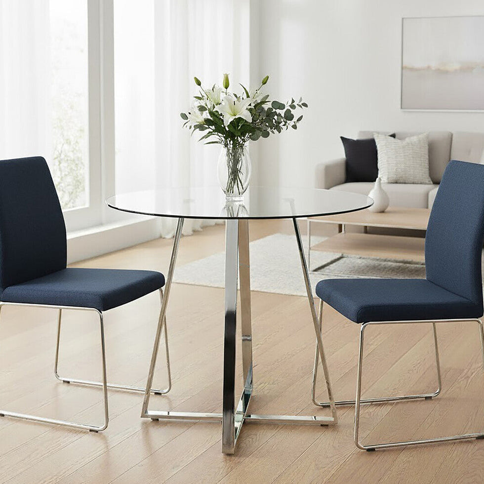 Metropolitan Clear Glass Round Dining Table with Silver Finish Legs