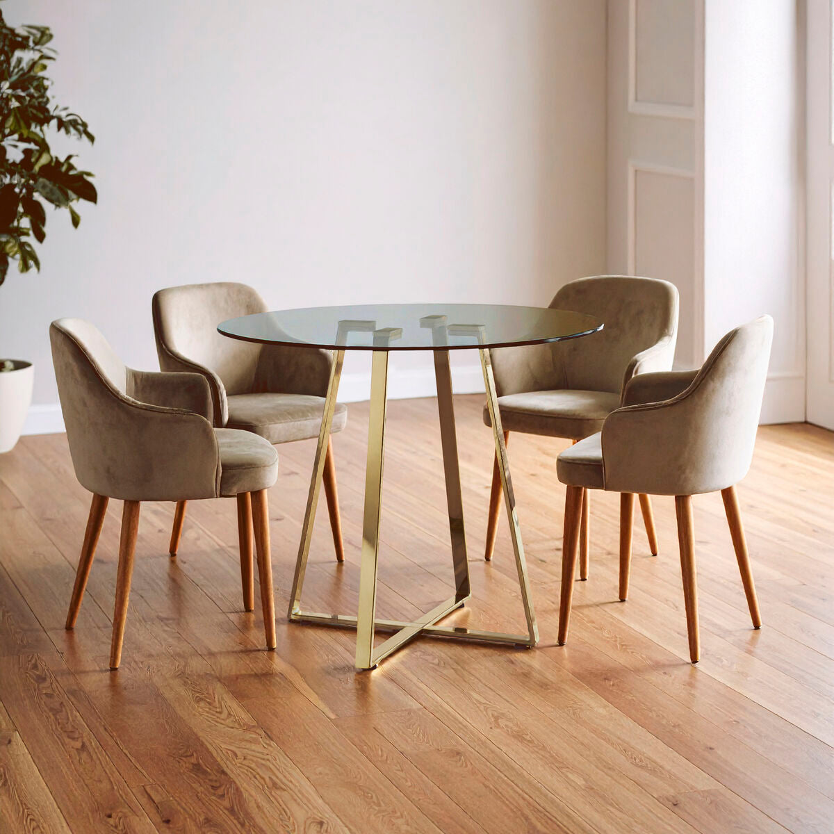 Metropolitan Clear Glass Round Dining Table with Gold Finish Legs
