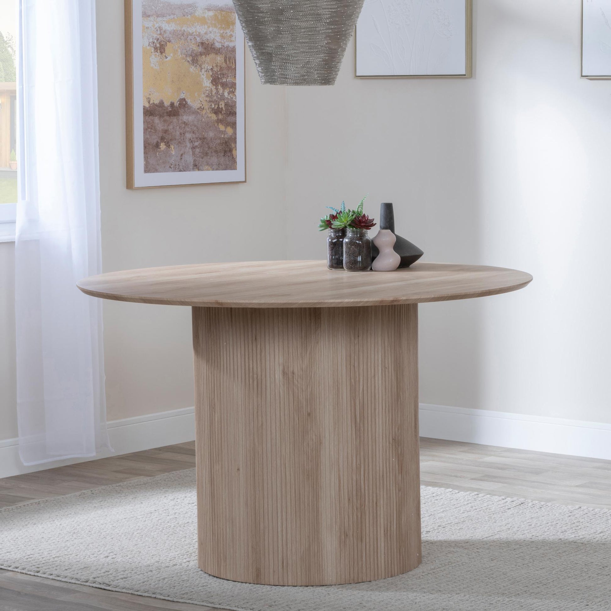 Renzo 120cm Oak Round Dining Table with Fluted Ribbed Drum Base