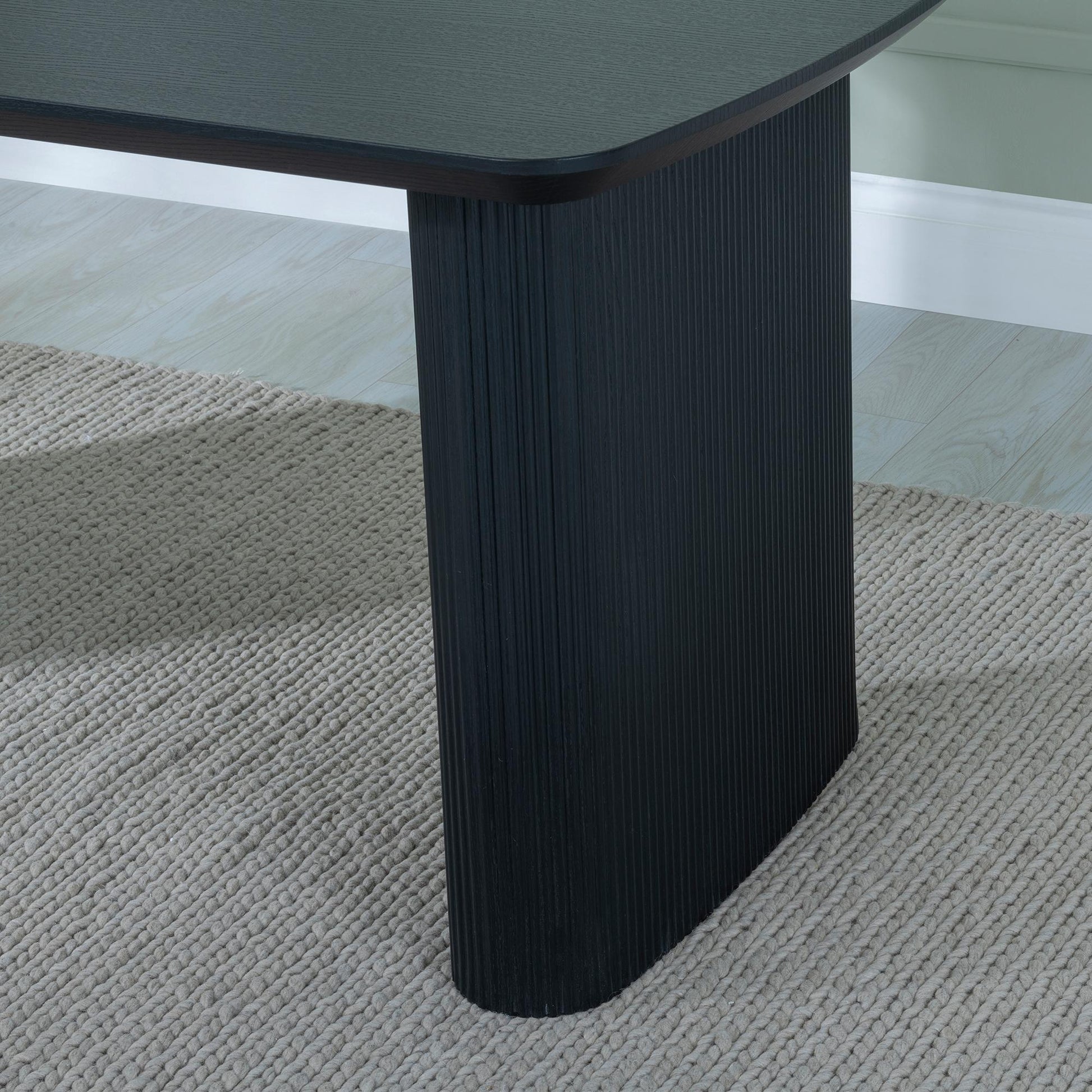 Renzo 160cm Black Oval Dining Table with Fluted Ribbed Double Pedestal Base