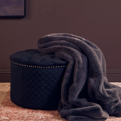 Zamora Round Black Velvet Ottoman with Button Tufting