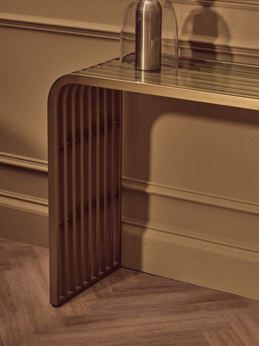 Vogue Clear Glass Console Table with Slatted Matt Gold Frame